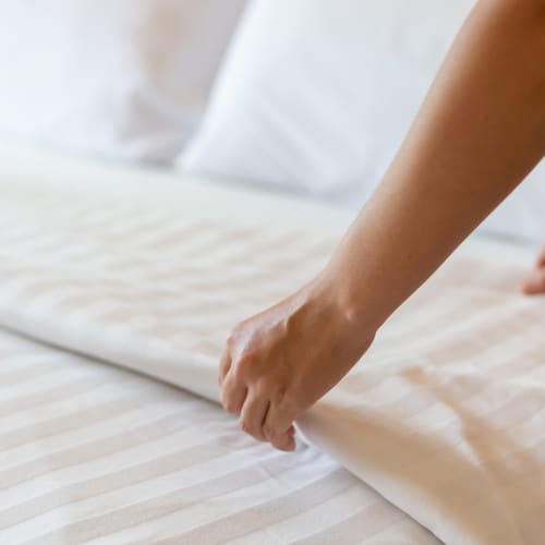 Why hotel bed sheets are so tightly tucked